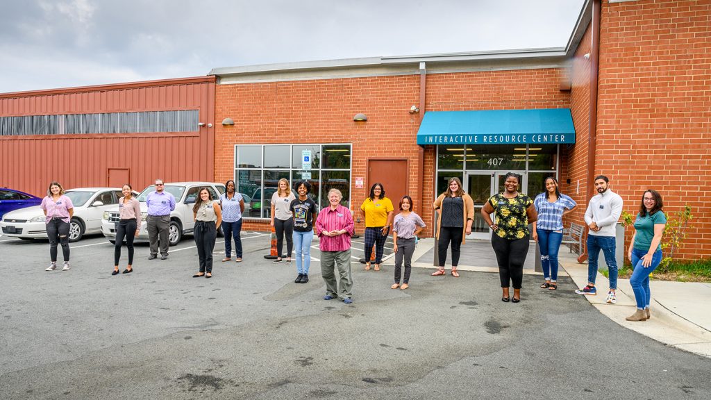 Fran Pearson and student interns at the Interactive Resource Center, for magazine story on the internship she leads. It is community-engaged social work wherein she oversees students providing services to local community members.